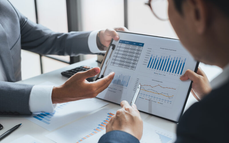 Businessman,Meeting,And,Working,With,Financial,Report,,Talking,About,Business Businessman,Meeting,And,Working,With,Financial,Report,,Talking,About,Business